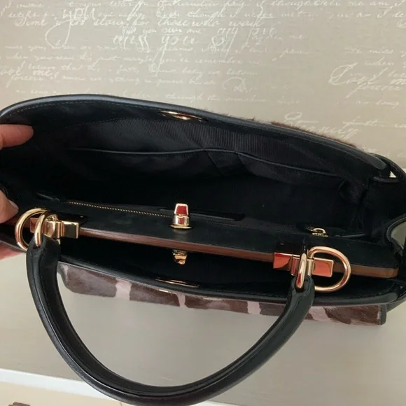 Coach,calf hair and leather top handle
Bag - Picture 9 of 14